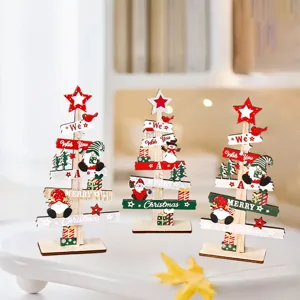 Mini wooden Christmas tree table decorations set with festive gnome figures and holiday signs.