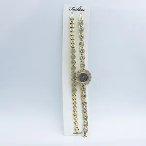 Montre-bracelet quartz strass or pour femme et bracelet assorti ensemble bijou élégant.