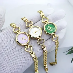 Goldfarbene Damen Quarzuhr Armbanduhr mit süßem Pferd Zifferblatt und Herzen Kettenglieder