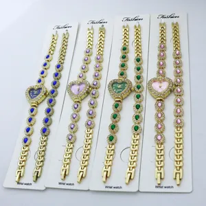 Coffret Montre Bracelet Quartz Femme Forme de Coeur Alliage Strass Montre Élégante Avec Bracelet Assorti Cadeau Pour Femme