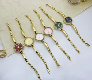 Women fashion quartz watch set featuring slim gold bracelet bands and rhinestone bezels.