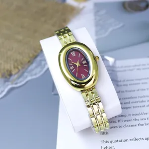 Oval vintage gold women watch with red dial and steel strap fashion luxury jewelry timepiece