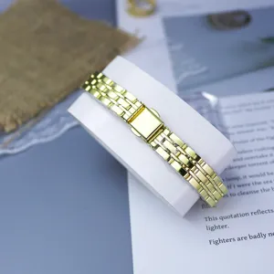 Golden women's watch replacement strap, elegant metallic link steel band for fashion styling.