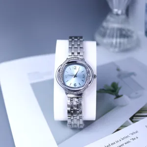 Women quartz watch silver steel strap rhinestone dial detail view elegant fashion accessory