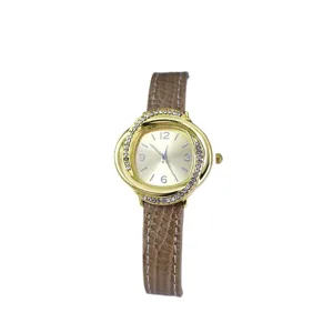 Fashion women quartz watch with crystal bezel and brown leather strap for daily wear.