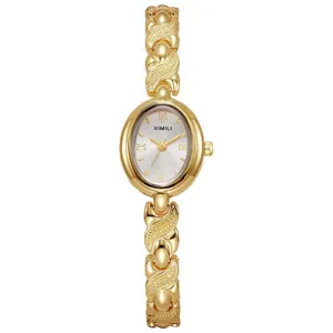 Élégante montre quartz pour femme en or avec cadran ovale et bracelet chaîne sculpté.