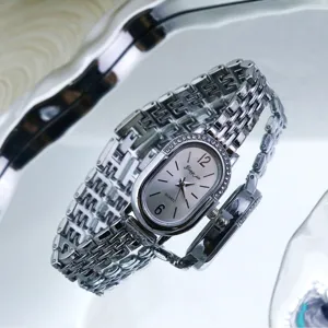 Elegant oval rhinestone quartz women's watch with polished metal strap for daily style.