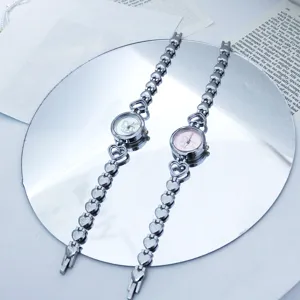 Damen Silber Herz Gliederarmband Quarzuhr mit niedlichem Pony Zifferblatt, zart und stilvoll.