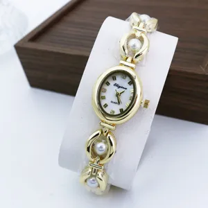 Elegant women's quartz watch with stylish pearl bracelet, luxury gold finish, ideal for daily wear.