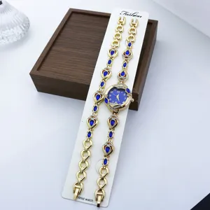 Modisches Damen Quarzuhren Armband Set mit blauen Tropfensteinen und glänzenden Kristallen.