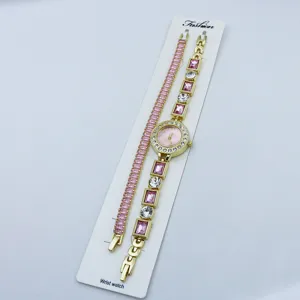 Orologio al quarzo da donna dorato e bracciale tennis con zirconi rosa eleganti.