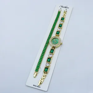 Orologio donna al quarzo dorato e bracciale tennis con cristalli verdi, set elegante.