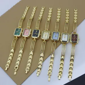 Detail shot of minimalist square quartz bracelet watches in multiple vibrant dial colors.