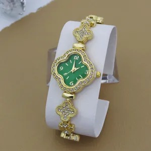 Montre quartz femme elegante dore cadran vert trefle strass bracelet bijou chic luxe