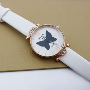 Reloj de cuarzo para mujer elegante con correa de cuero blanco y esfera de mariposa.