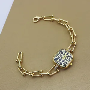 Goldene quadratische Quarzuhr mit Leoparden-Zifferblatt und stilvollem U-Ketten-Armband.