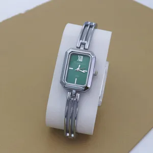 Elegant women's quartz watch with a sleek silver bangle strap and dark green rectangular dial.