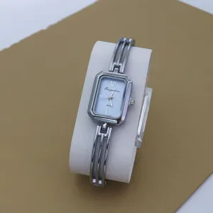 Elegant women's quartz watch with a unique silver bracelet strap and chic blue square dial.