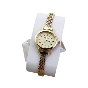 Elegante goldene Quarz Damenuhr mit schmalem Kettenarmband und rundem Zifferblatt