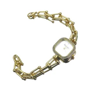 Gold chain link quartz wristwatch with square rhinestone dial for women luxury style.