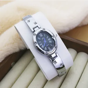 Elegant women's oval quartz watch with silver bracelet strap and sparkling rhinestones dial.