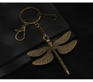 Vintage bronze dragonfly keychain, detailed animal pendant key ring for bags and car keys.