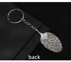Vintage Chinese style metal keychain with carved fan pendant for bags and car keys
