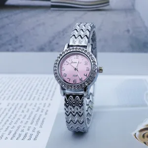 Elegant women's quartz watch with pink rhinestone dial and silver zigzag metal bracelet.