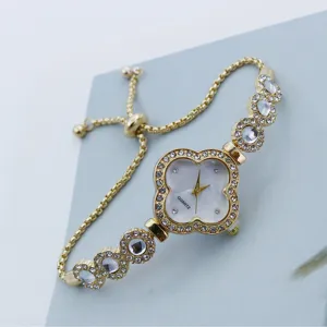 Orologio da donna al quarzo con quadrante a trifoglio, cristalli brillanti e catena.