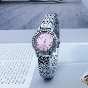 Women quartz watch with pink dial rhinestone bezel and wave metal strap fashion daily wear.