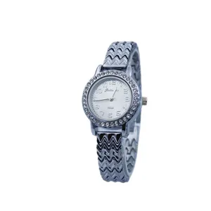 Fashion rhinestone quartz watch for women with stylish zigzag metal bracelet and clear dial.