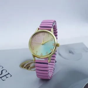 Women fashion quartz watch with colorful gradient dial and pink stretch metal strap.