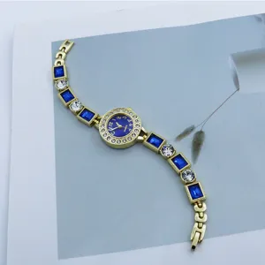 Women's fashion quartz bracelet watch with blue square stones and shiny rhinestones gold tone
