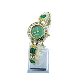 Elegant gold women quartz watch with green dial and sparkling rhinestones crystal bracelet.