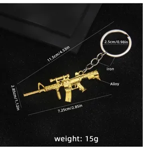 Llavero de rifle en miniatura dorado colgante pistola aleación accesorio mochila