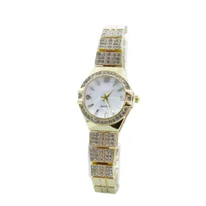 Elegante dames quartz horloge met strass steentjes goudkleurige metalen band kristallen bezel.