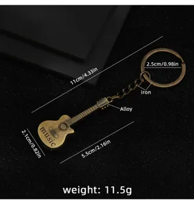 Portachiavi con chitarra in metallo vintage ciondolo bronzo antico regalo musica