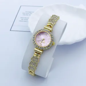 Elegante goldene Strass Quarz Damenuhr mit rosafarbenem Zifferblatt und Armband Modeschmuck.