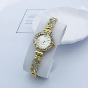 Goldene Strass Quartzuhr für Damen, elegante kleine Armbanduhr mit funkelnden Diamanten.