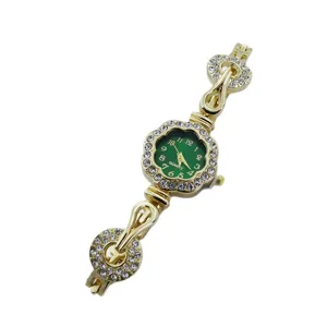 Elegante reloj de cuarzo para mujer dorado con esfera floral verde y pulsera strass