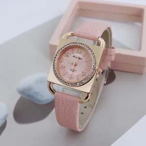 Stylish pink square quartz watch for women featuring rhinestone bezel and leather strap.