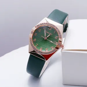 Women quartz watch with green PU leather strap, rose gold rhinestone bezel and textured dial.