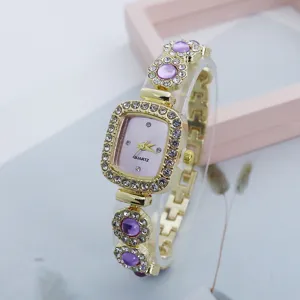 Luxury square rhinestone quartz watch for women, elegant gold bracelet fashion timepiece.