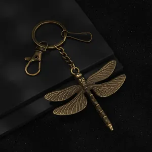 Vintage bronze dragonfly keychain for car keys bags, minimalist metal animal pendant accessory.