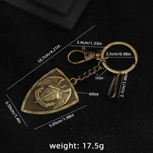 Vintage bronze alloy shield keychain with Saint Michael motif, durable metal keyring and hook.