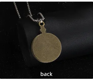 Vintage round stainless steel necklace detail view showing back mesh texture design pendant accessory