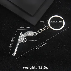 Simulation metal pistol keychain alloy gun shape car bag pendant gaming peripheral gift.