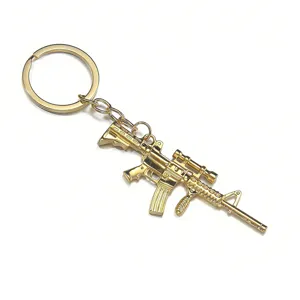Llavero de rifle de asalto de metal dorado colgante bolso arma táctica genial