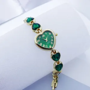 Green heart quartz watch with green crystal bracelet, elegant fashion wristwatch for women.