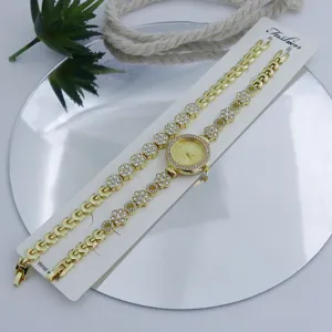 Ensemble montre bracelet quartz femme strass or de luxe, montre design floral élégant pour dame.